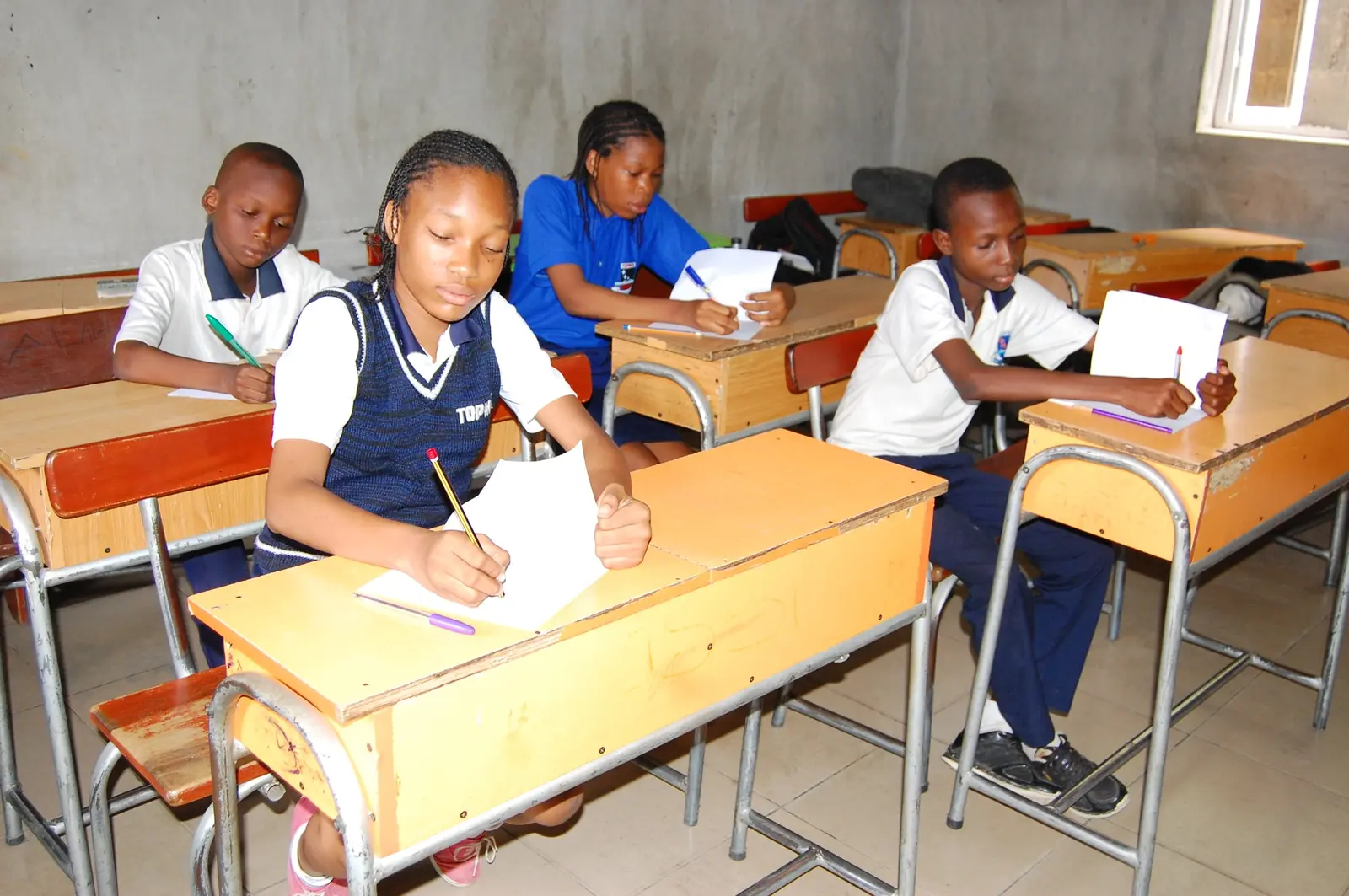 Topmax students learning in class